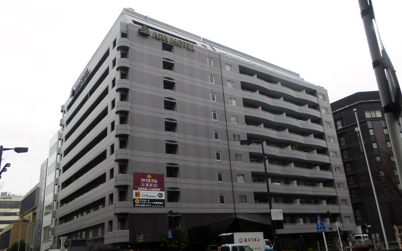 An APA hotel building near Kyoto Station, seen from the street