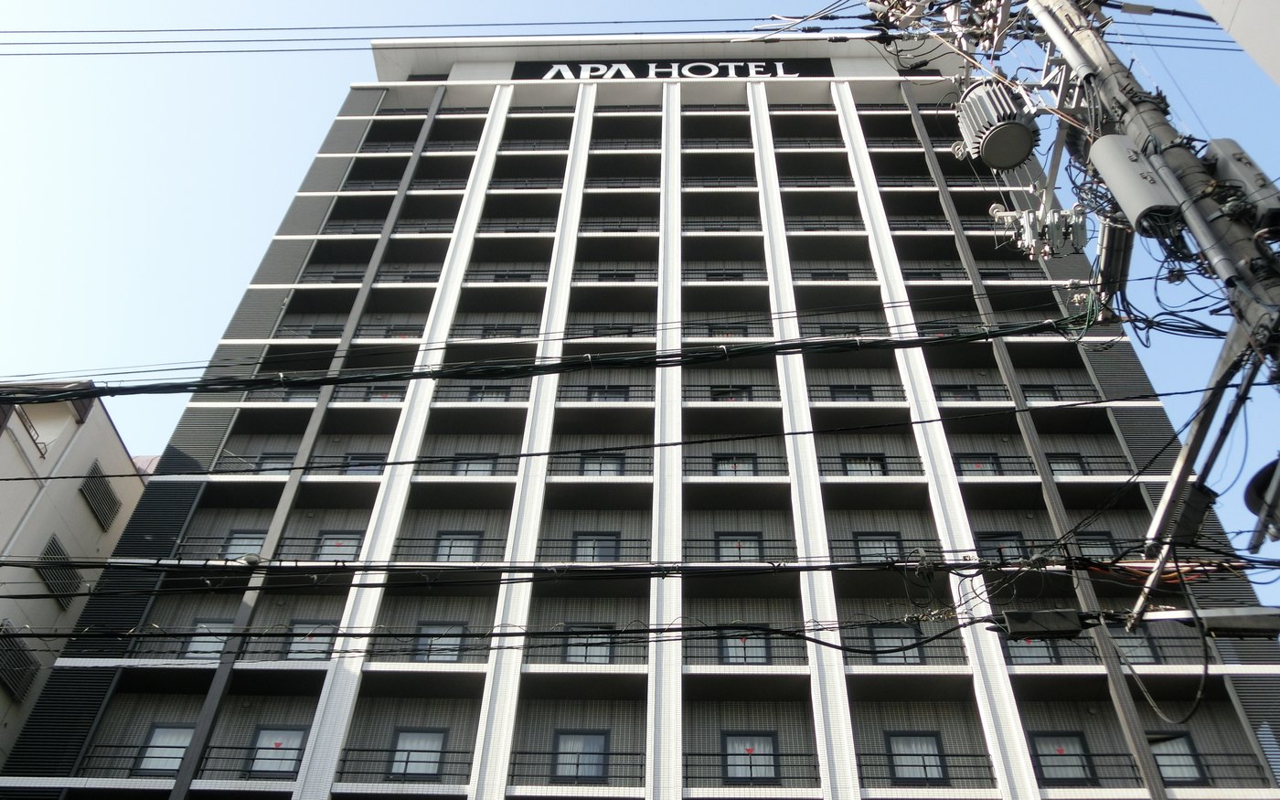 An APA Hotel tower in the Namba district of Osaka, sign on the roof