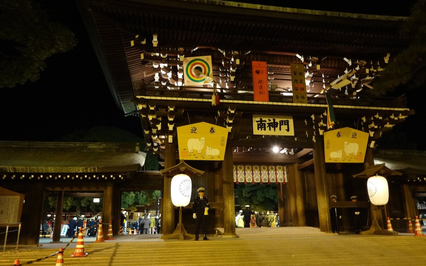 The south gate at Meiji Jingu on New Year's Day, lit after dark