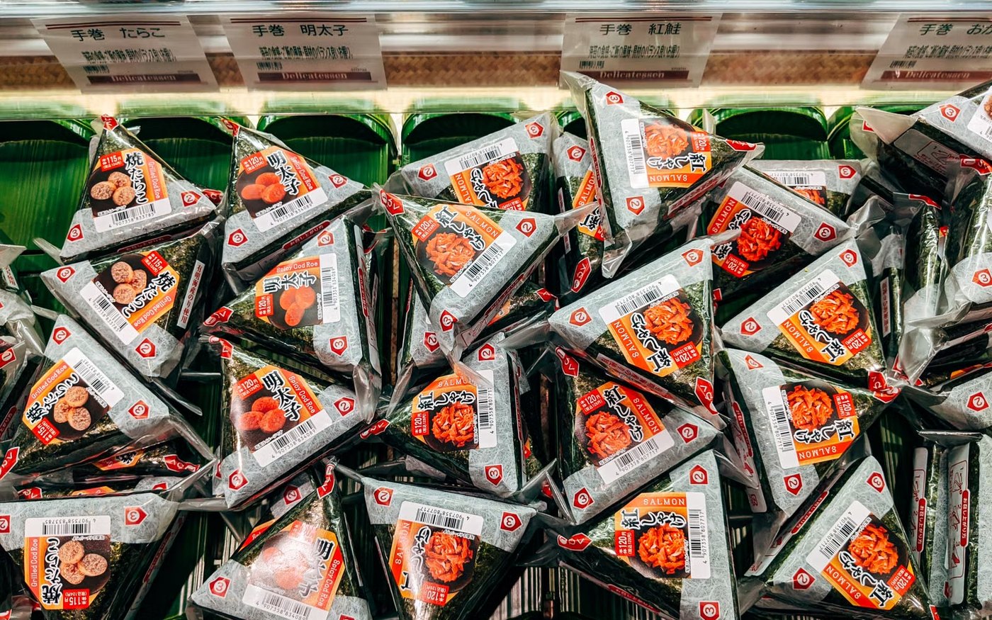 Packaged onigiri rice balls on a convenience-store shelf