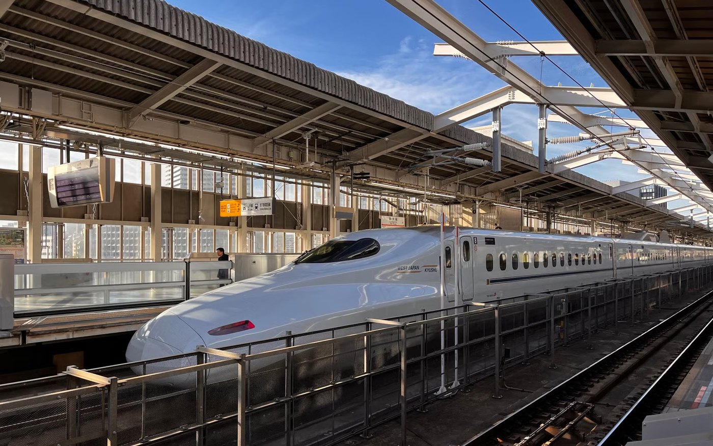 A shinkansen at a platform in Osaka station