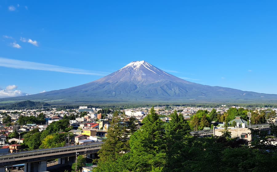 Mount Fuji above the town of Fujiyoshida, seen from the observation deck at Arakurayama Sengen Park