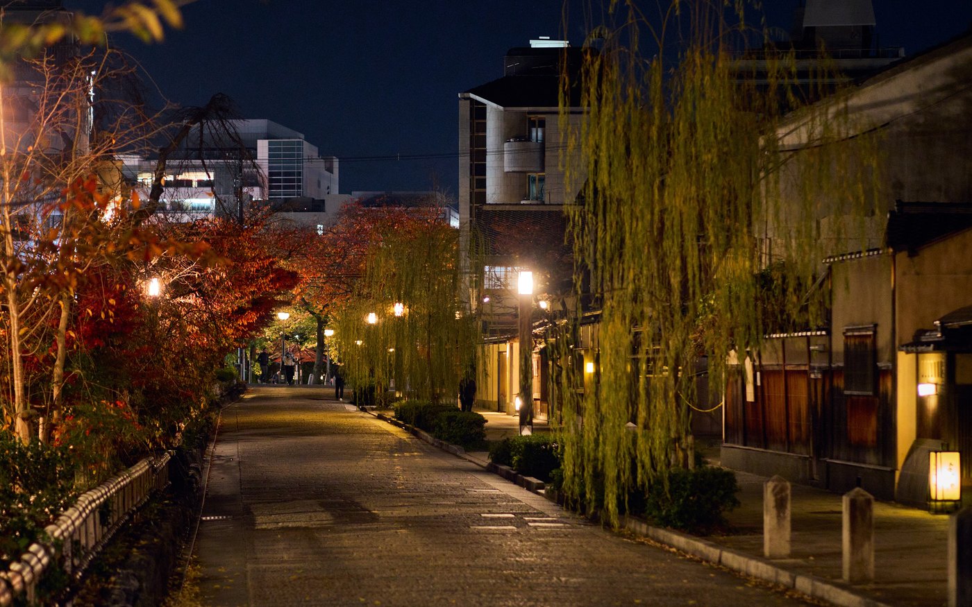A preserved wooden lane in Gion, Kyoto, lit at dusk