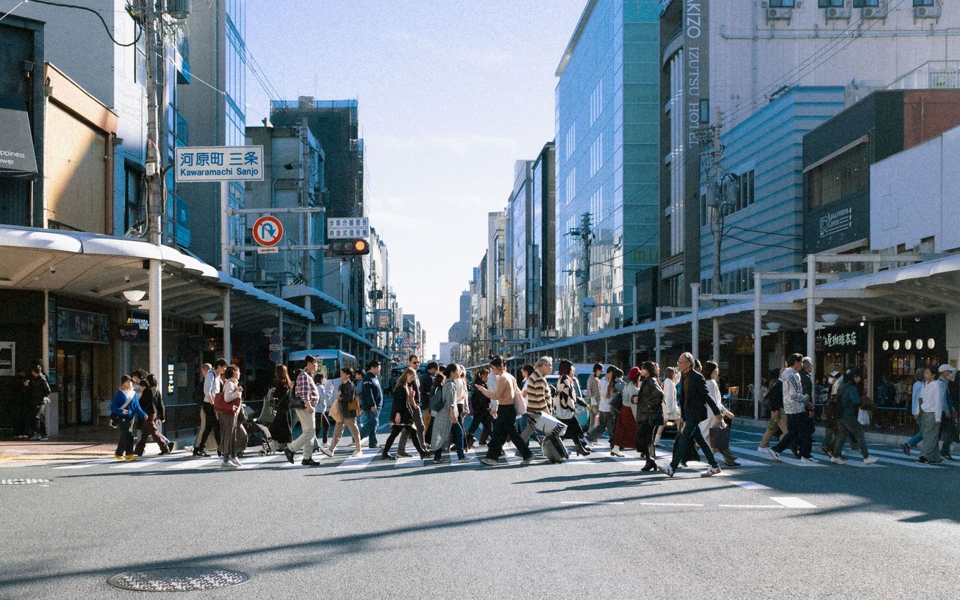 Pedestrians crossing the road at Kawaramachi in central Kyoto