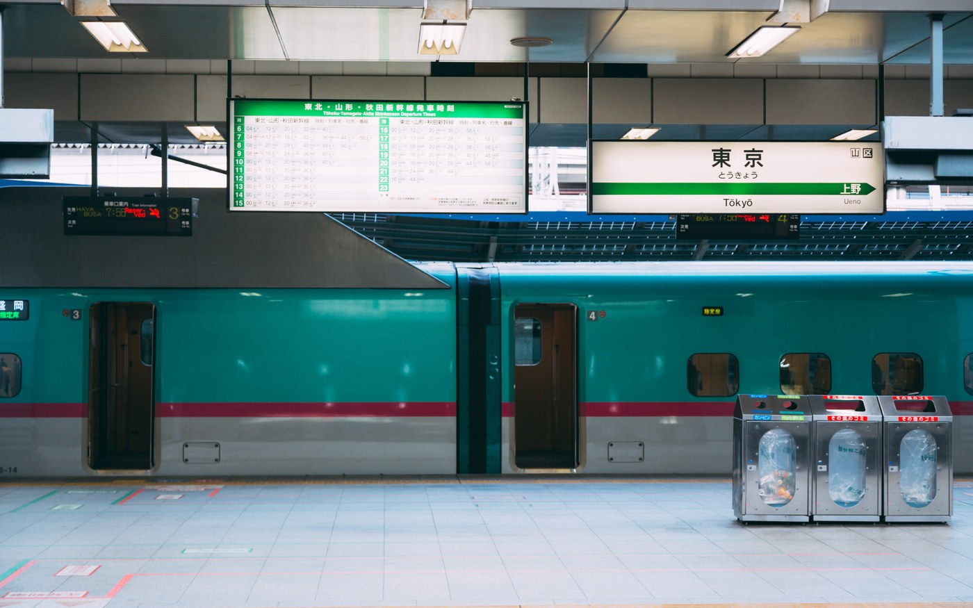 A Tohoku Shinkansen train waiting at a platform in Tokyo Station