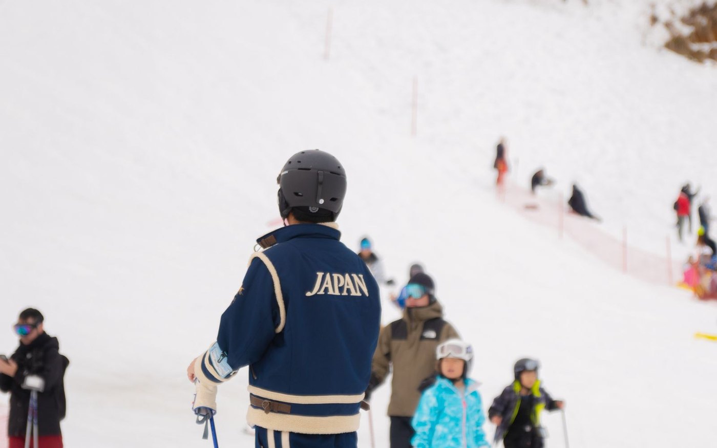 Skiers setting off on a snowy slope